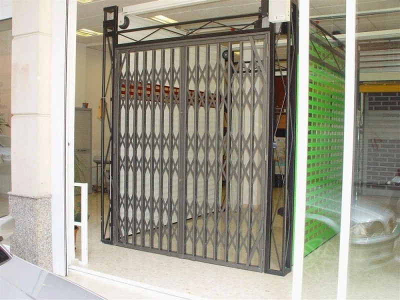 Mansergas, S.A. (Mantenimiento de Puertas)